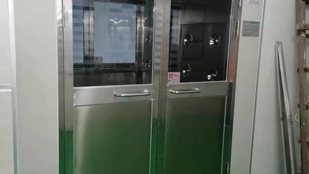 Wide door cargo air shower system for forklift access